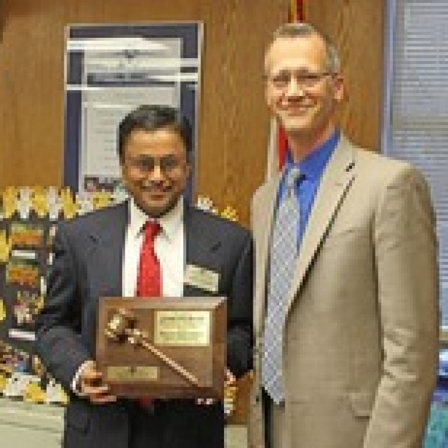 Venki Palamand, who served six years on the Mehlville Board of Education, was honored for his service last week. Palamand, left, who served as board president the past two years, is shown with Superintendent Eric Knost. 