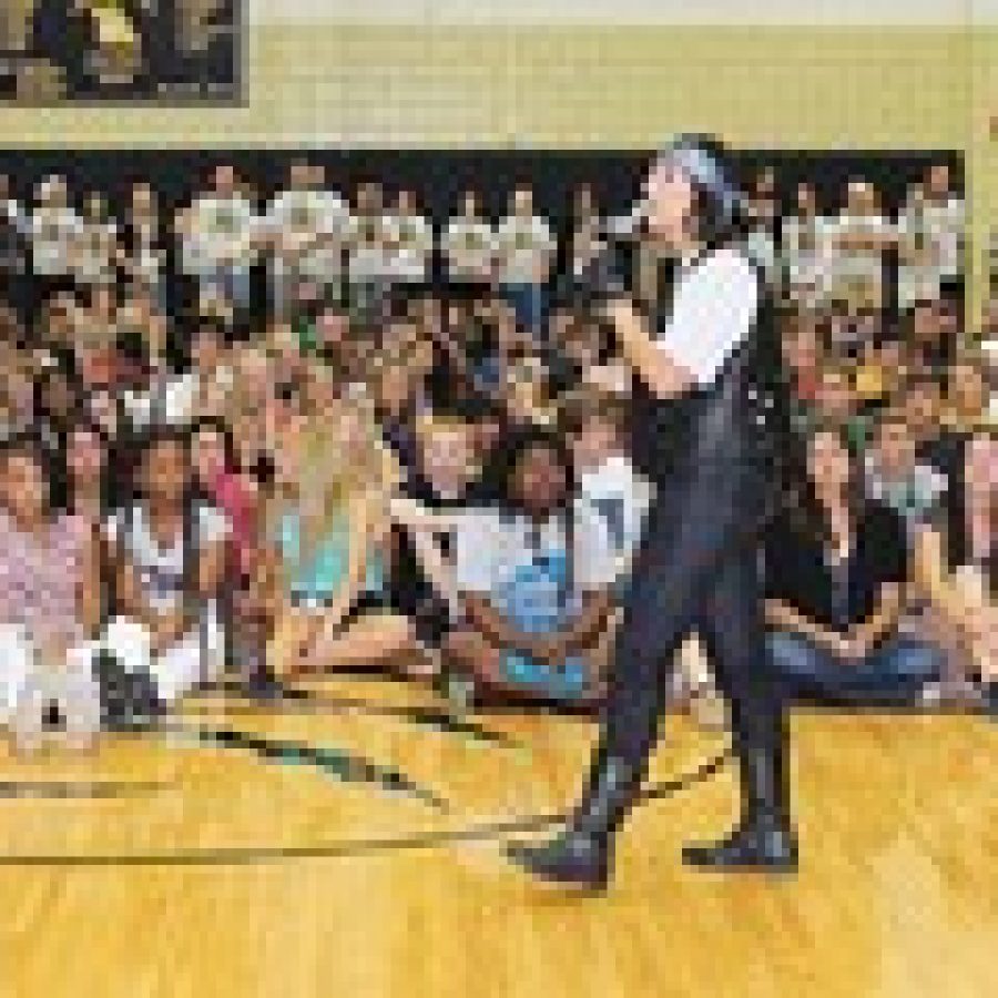 Oakville Senior High School Principal Jan Kellerman was appropriately dressed for her entrance on a motorcycle at an all-school assembly on the first day of school last week. 