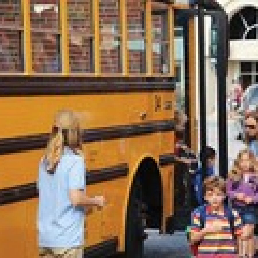 Students arrive for the first day of class at Sappington Elementary. 