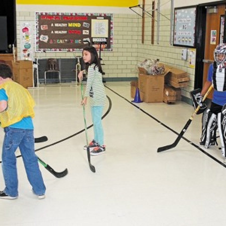 Bierbaum Elementary students now enjoy playing street hockey during their gym classes, thanks to a generous donation of hockey equipment from the St. Louis Blues.