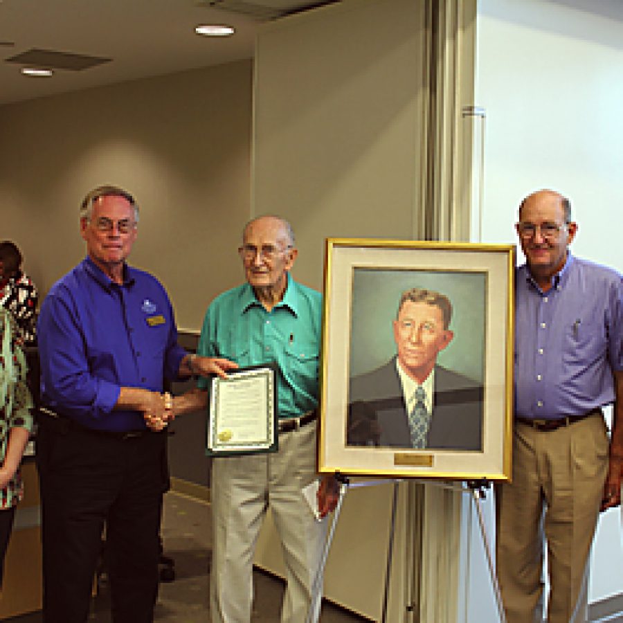 The Lindbergh Board of Education on Aug. 9 adopted a resolution rededicating Dressel School in honor of John Martin Dressel, the first board president of Lindbergh Schools. Pictured with Lindbergh board President Vic Lenz second from left are family members of John Martin Dressel. Family members from left include granddaughter Karen Sell, son Roy Dressel, and grandson Ken Dressel with his wife, Barbara Dressel.