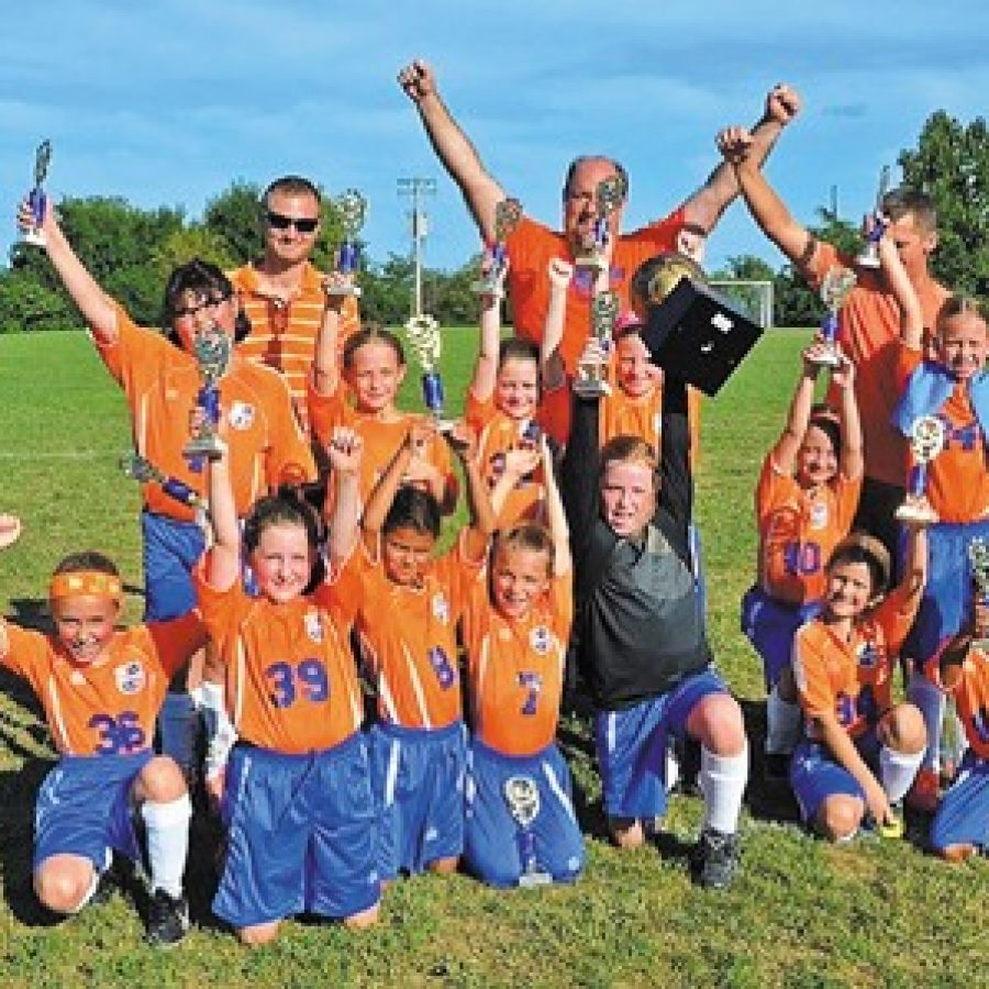These St. Francis of Assisi soccer players recently captured the Panther Cup.
