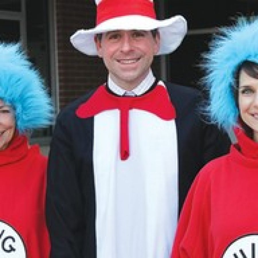 At Rogers Elementarys Read Across America Week event, from left, are: Sherry McCarthy, Principal Patrick Keenoy andBecky Roesch. 
