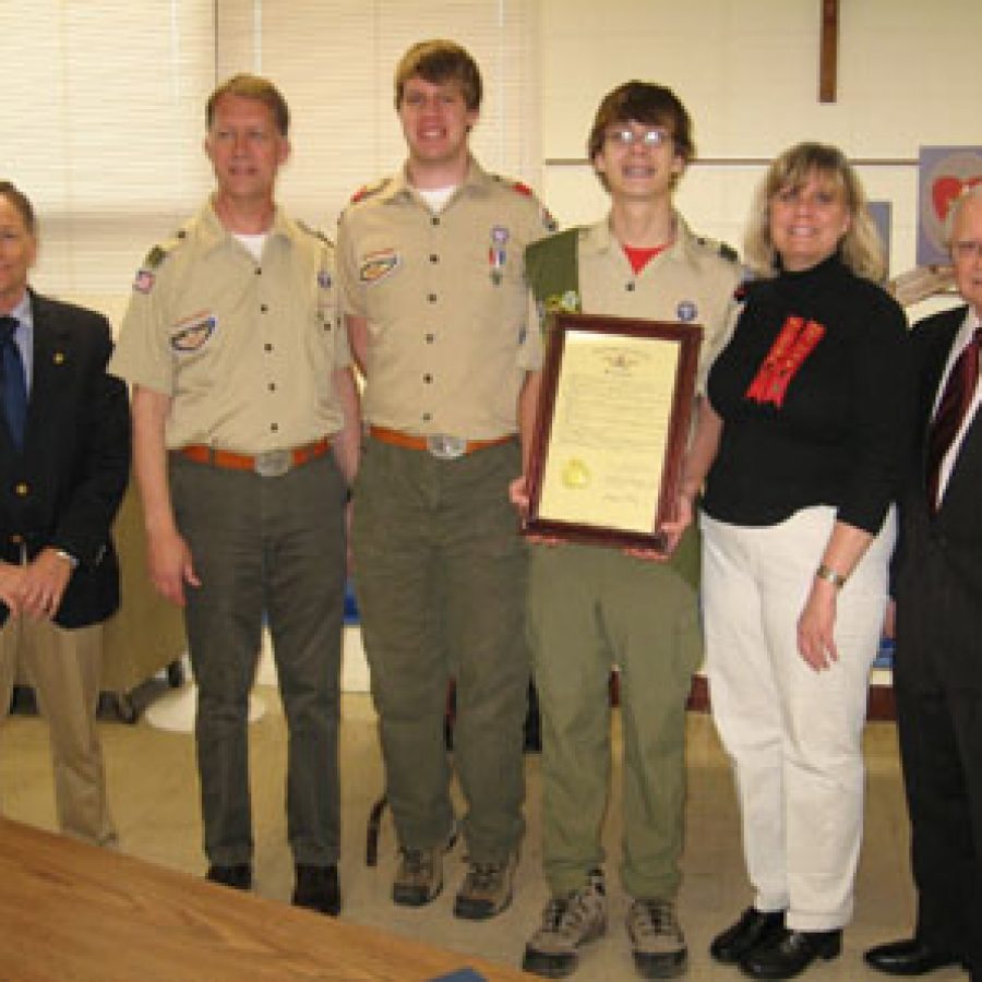 A resolution from the Missouri House of Representatives honoring Michael Dempsey for earning the rank of Eagle Scout was presented by Rep. Gary Fuhr and former Rep. Walt Bivins. Pictured, from left, are: Fuhr, Henry Dempsey, David Dempsey, Michael Dempsey, Mary Dempsey and Bivins.