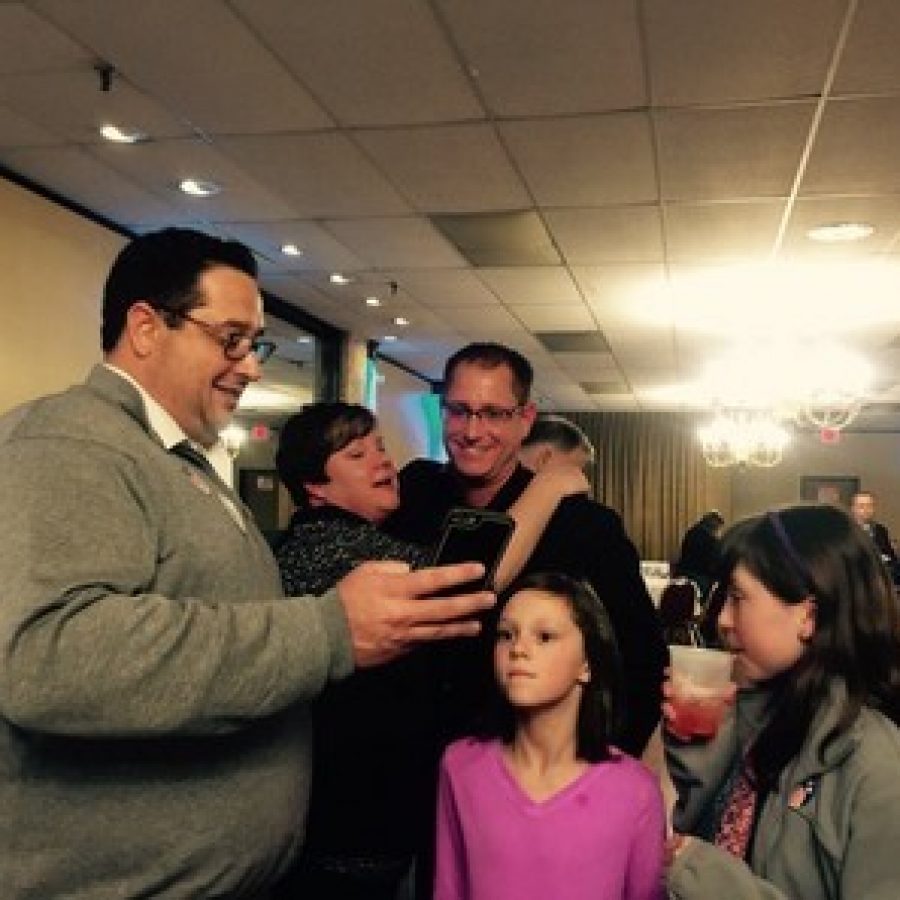 Mark Haefner, Mehlville-Oakville United Committee organizer Kimberly Hanan-West and Assistant Superintendent Jeff Bresler react to the 67-percent lead for Prop R with 16 percent of precincts reporting Tuesday night.