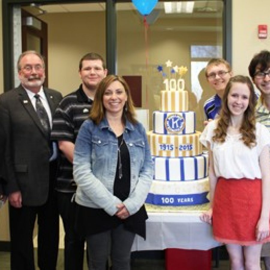 Kiwanis International President Dr. John Button and his wife, Debbie, left, celebrate 100 years of Kiwanis International with Lindbergh High School Key Club sponsor Kim Dailey, front left, and Key Club officers, from left, David Struckman, Marty Taber, Kaley Burroughs and Josh Berry.
