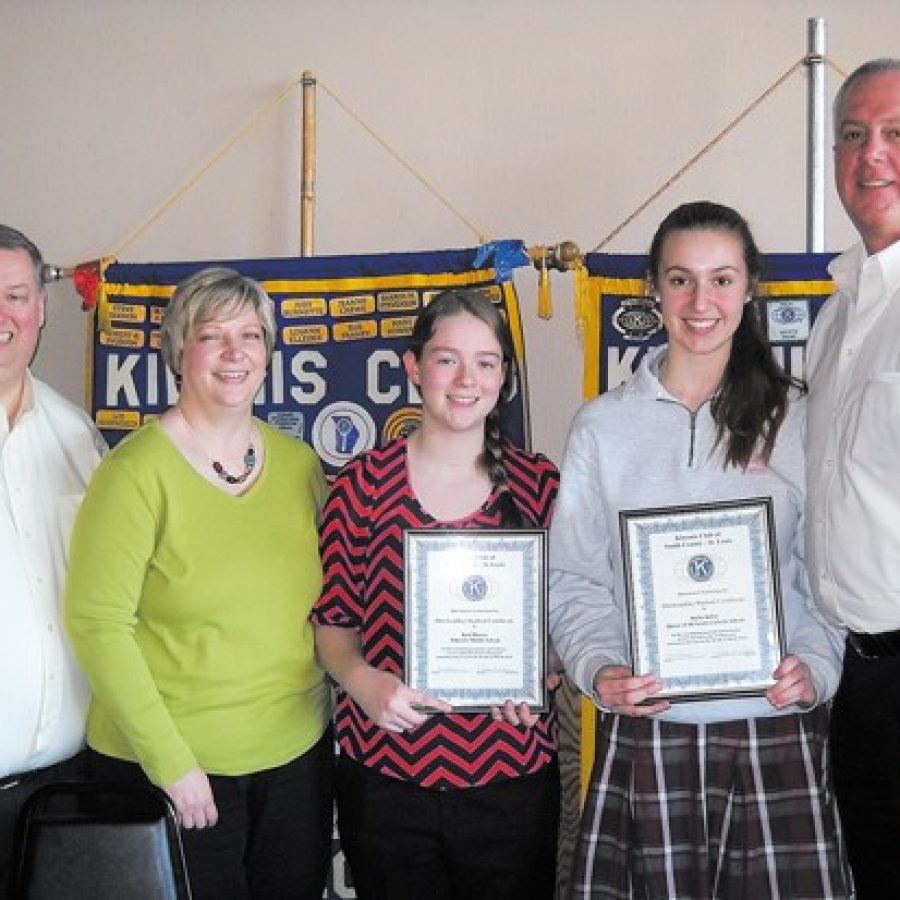 Kiwanis Students of the Month Keri Hinsen and Hallie Kilfoy are pictured with their parents, Mark and Tara Hinsen and Tim Kilfoy.