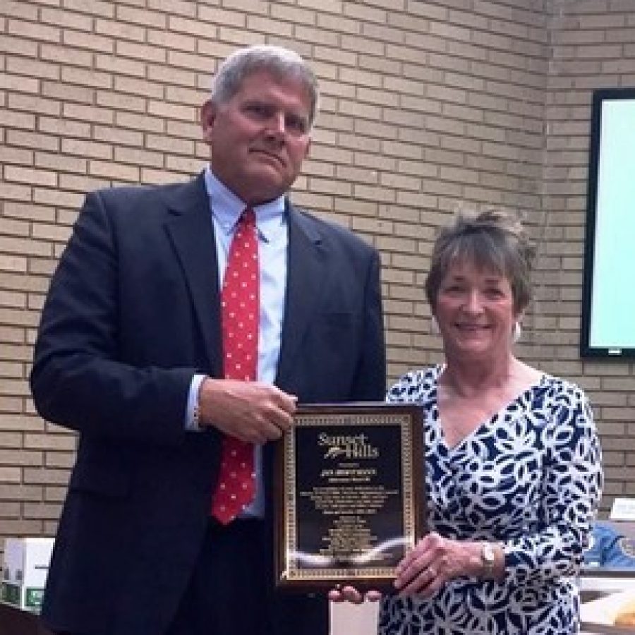 Mayor Mark Furrer, left, with former Ward 3 Alderman Jan Hoffmann the night she left the board.