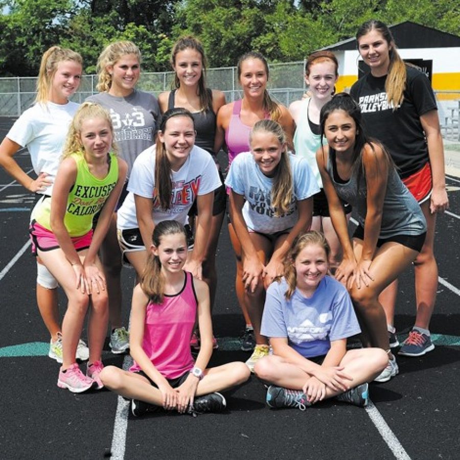 Oakville High head girls cross country coach Drew Moore says his runners have been working hard this summer, hoping to improve on last seasons record.