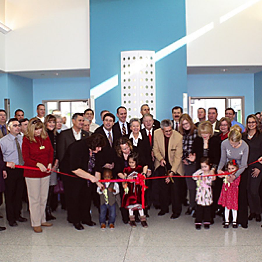 Board of Education members, administrators, state legislators, local elected officials and pupils celebrate the grand opening of Lindbergh Schools new 28,650-square-foot Early Childhood Education center at 4814 S. Lindbergh Blvd.