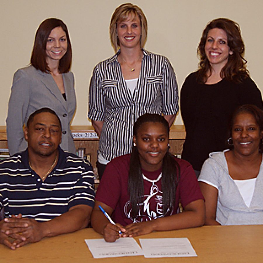 Mehlville High School senior Chanese Washington signed a letter of intent to continue her basketball career at the collegiate level when she joins the Lindenwood University  Belleville womens basketball team this fall. Pictured front row, from left, are: Carlton, Chanese and Stephanie Washington. Back row, from left, are: Annie Ewing, head coach of the Lindenwood University - Belleville womens basketball team; Laura Bishop, MHS varsity basketball coach and Jacqueline Wamser, MHS varsity basketball assistant coach.