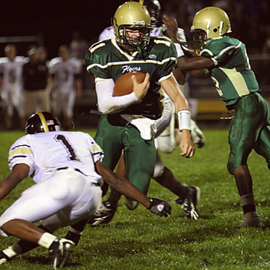 Lindbergh High School quarterback Kyle Portell breaks to the outside in the Flyers 38-14 win over Lafayette. Stephen Glover photo