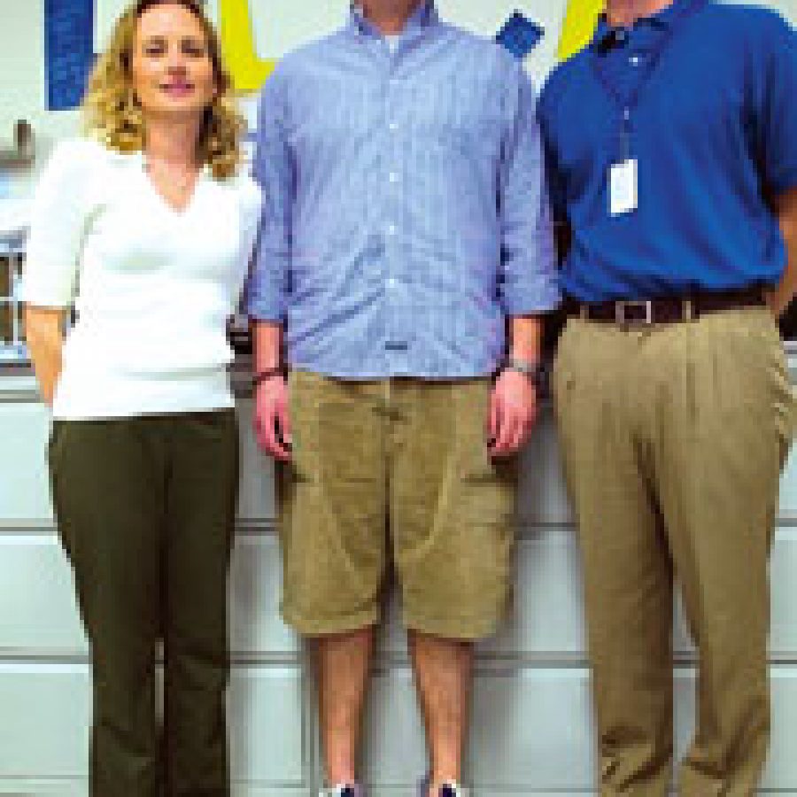 Lindbergh High senior Brian Maloy, center, wants to major in marketing when he attends college this fall in Bolivar. He credits his teachers Michelle Totchka, left, and Colby Schmid for his career path.
Bill Milligan photo 