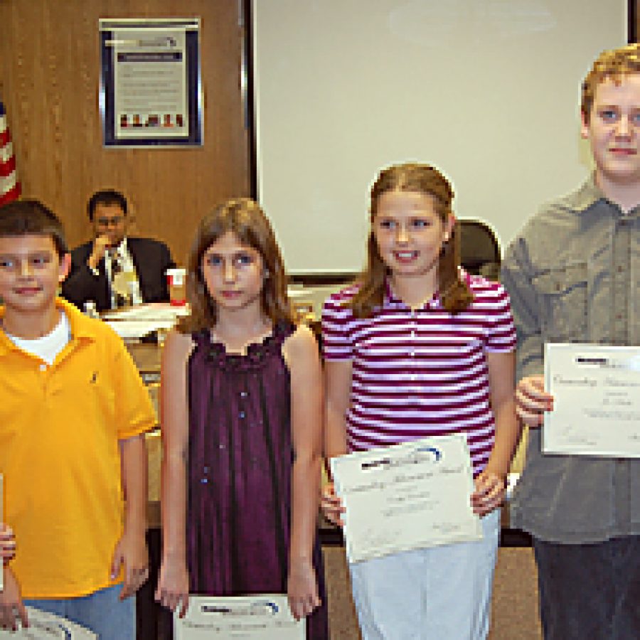 Six pupils who earned perfect scores on a section of the Missouri Assessment Program tests last spring were honored at the Nov. 19 Board of Education meeting. Pictured with board President Tom Diehl, from left, are: Alexis Pauls, Samed Ganibegovic, Chloe Willmering, Emily Davidson, Joe Schulte and Christopher Brooks.