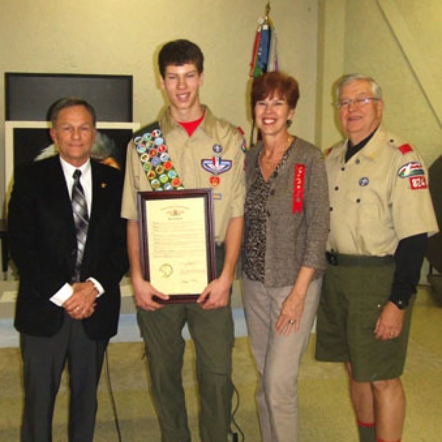 A resolution from the Missouri House of Representatives honoring Mark Messler for earning the rank of Eagle Scout was presented by Rep. Gary Fuhr. Pictured, from left, are: Fuhr, Mark Messler, Carolyn Messler and Harold Messler.