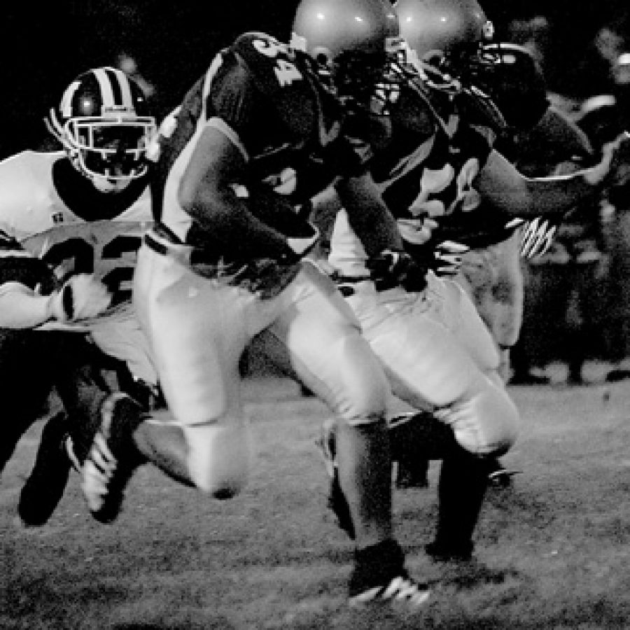 Bill Milligan photo
Lindbergh senior Charlie Schinsky plows through an opening in the Mehlville defense during the first quarter of Fridays 21-14 win over rival Mehlville.