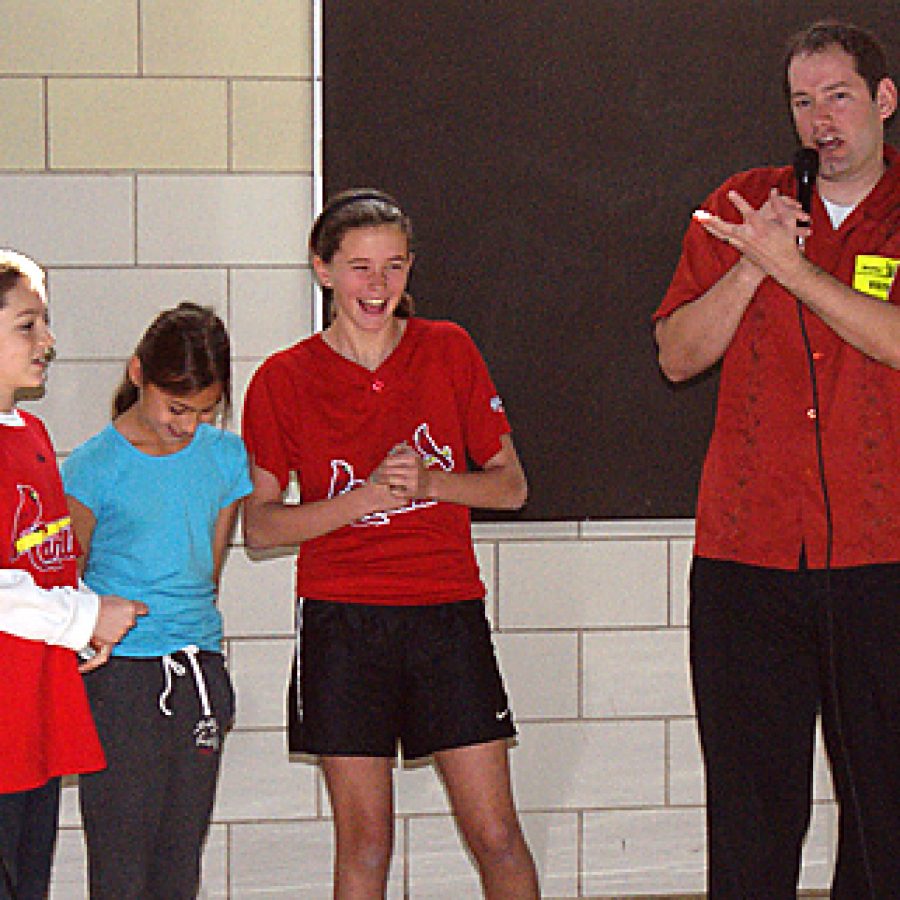 New York Times bestselling author Brandon Mull, right, best known for his Fablehaven series of fantasy books, stressed to Blades Elementary third, fourth and fifth grade students this week the importance of growing and using their imagination by reading books and participating in creative activities.