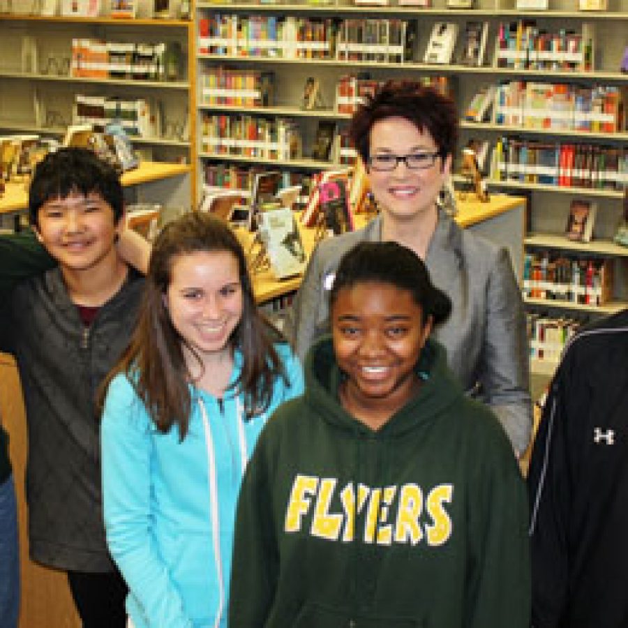 Truman Middle School Principal Jennifer Tiller has been named the 2012 Missouri Middle School Principal of the Year by the Missouri Association of Secondary School Principals. She is joined by eighth-grade students, from left, Kennedy Sabin, Murodbek Choriev, Madeline Boccardi, Briara Williams and Collin Breeding.