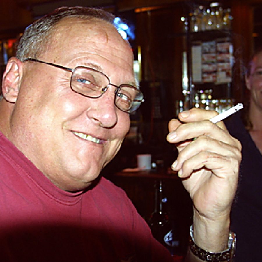 Concord resident Dan Logger opposes a smoking ban in public places because he believes it would affect businesses operated by many of his friends. Im against it, he said Saturday. Also pictured is Schottzies Bar and Grill bartender Lana Sugg. Bill Milligan photo