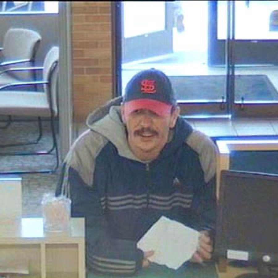 FBI officials believe this man robbed the PNC Bank in Crestwood today — Dec. 15. They say photos obtained today have the best view yet of the Logo Bandit.