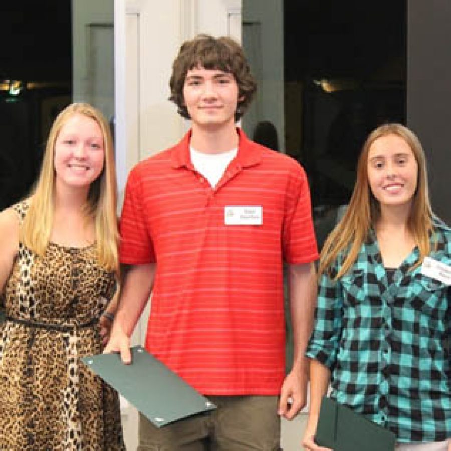 National Merit Commended Students, from left, Katelyn Freund, Eliot Courtois and Elizabeth Black were honored by the Lindbergh Schools Board of Education on Oct. 11. Nine Lindbergh students qualified for this distinction in all.