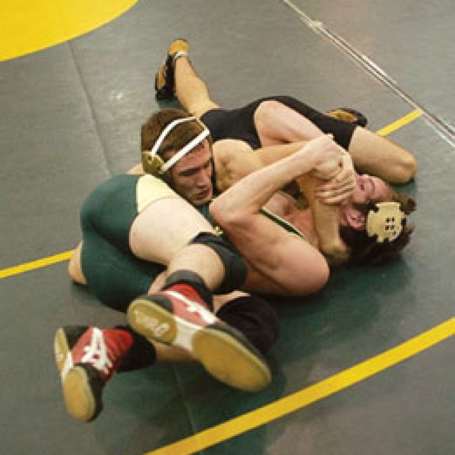 Lindberghs Ben Lachmann struggles to avoid a pin by Lafayettes Adam Varner Saturday afternoon during the Class 3 Sectional 1 Tournament at Lindbergh High School. Lachmann was declared pinned moments later.
Bill Milligan photo
 