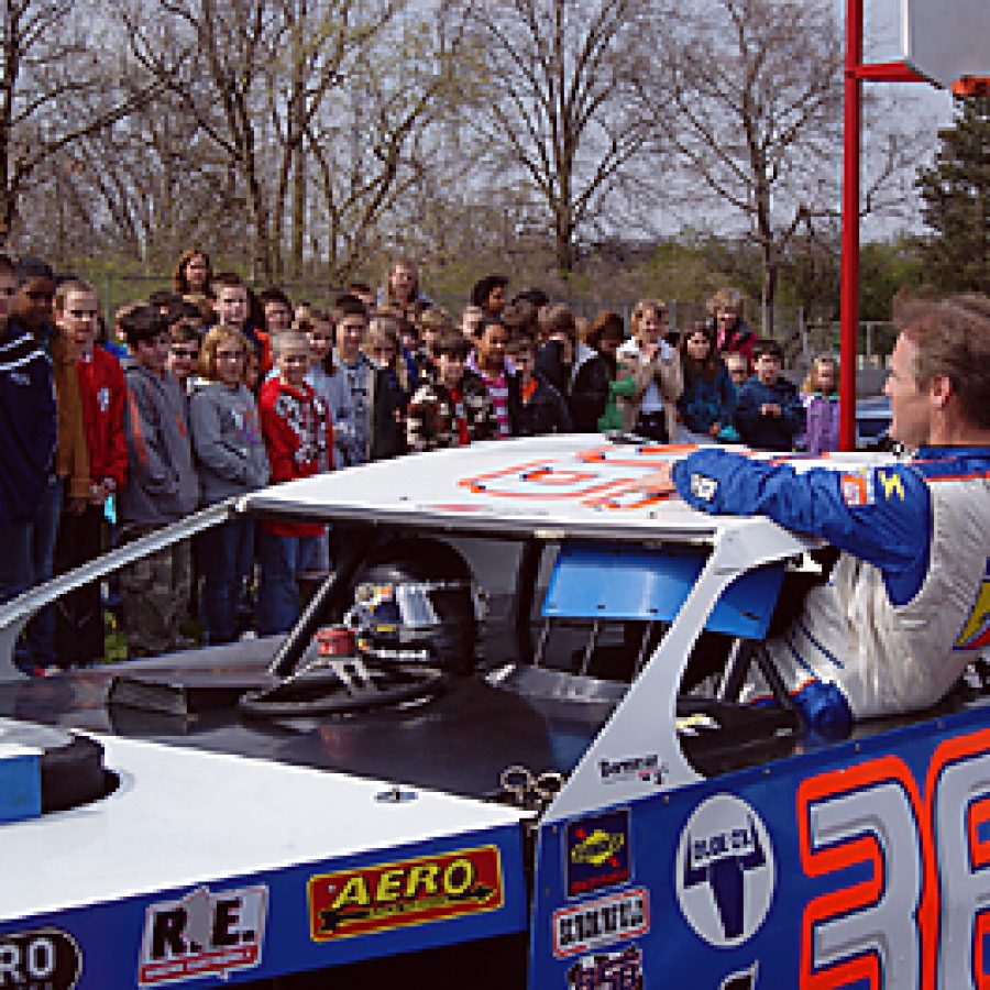 Following his motivational presentation about preparing for the Missouri Assessment Program tests, NASCAR driver and former Beasley Elementary first grader Kenny Wallace gave Beasley students a close-up view of his dirt track racecar during a visit on March 30.